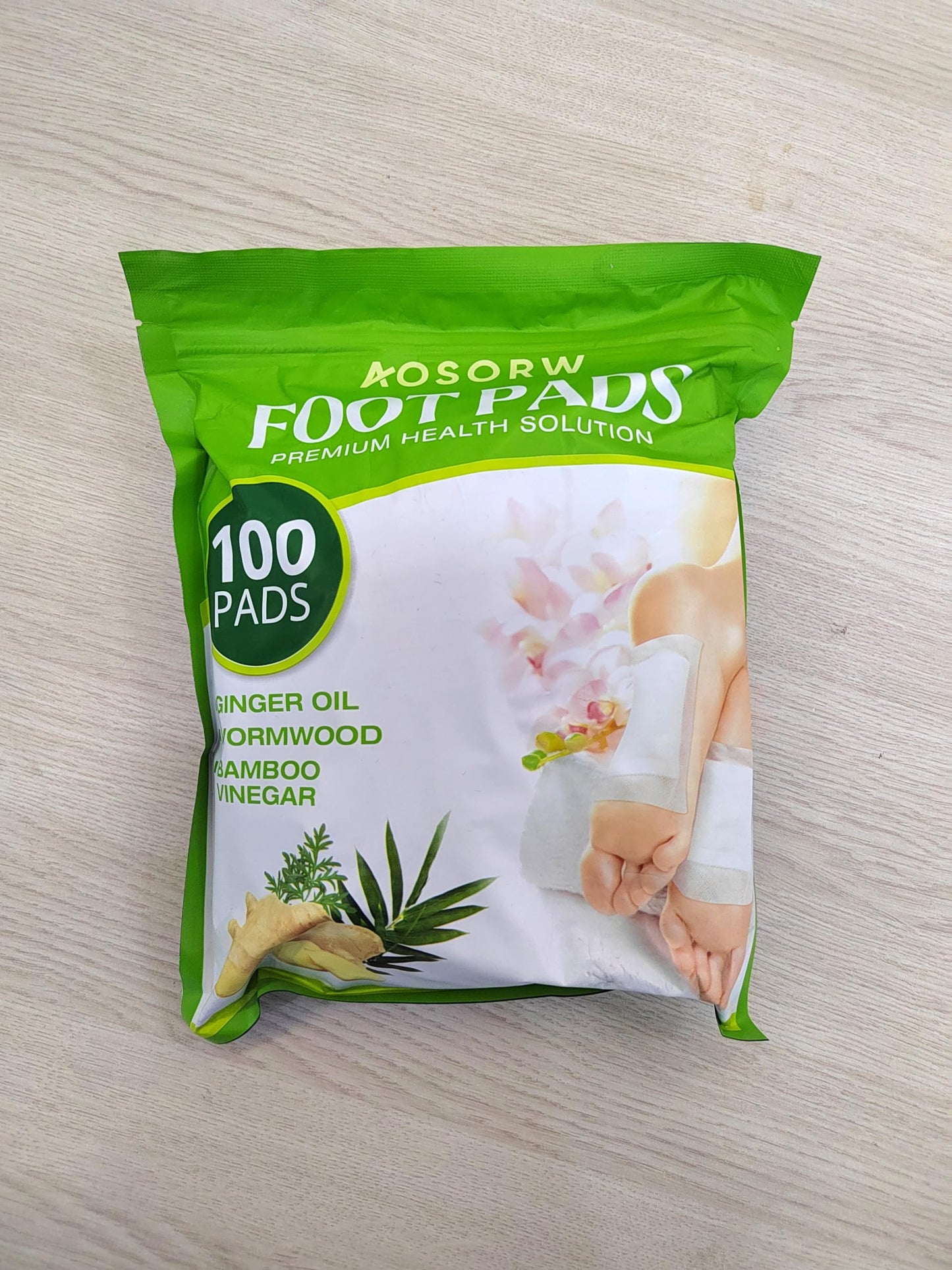 AOSORW Natural Herbal Foot Pads - 100 Pack Ginger Oil & Bamboo Charcoal Premium Foot Care Patches - Relieves Stress and Fatigue - Improves Sleep and Supports Body Cleansing